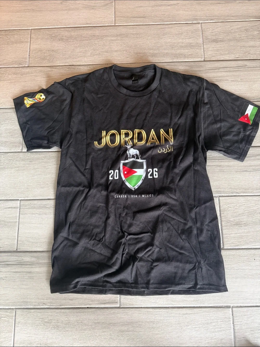 Jordan Black Short‑Sleeve Crest Tee with Gold Logo World Cup 2026 brand new
